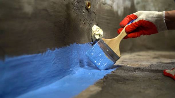 SJ Waterproofing Pros commercial waterproofing team near Roosevelt, NY
